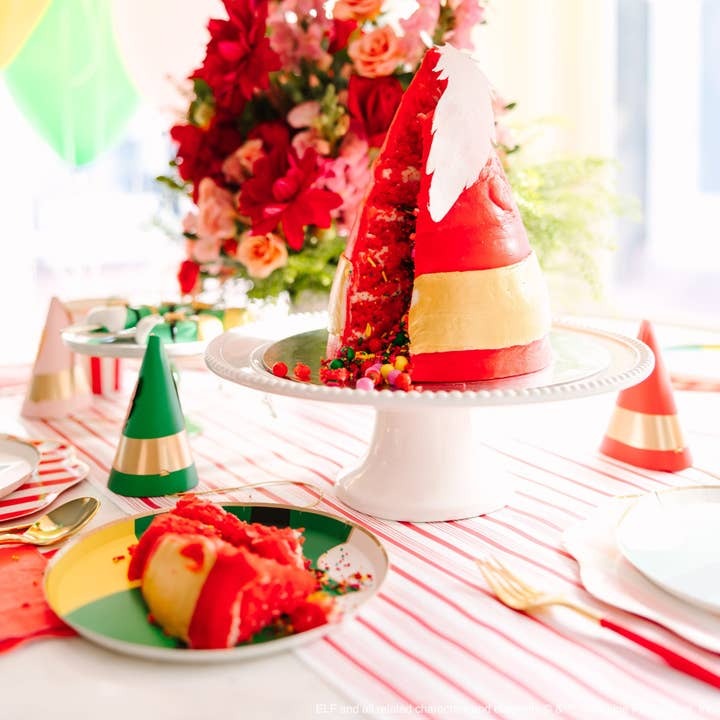 Red yellow cone shaped cake with sprinkles festive birthday table decor from Parte Haus party supply store in Bethesda MD
