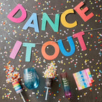 Rainbow dance banner confetti and colorful cups birthday celebration from Parte Haus party supply store in Bethesda MD