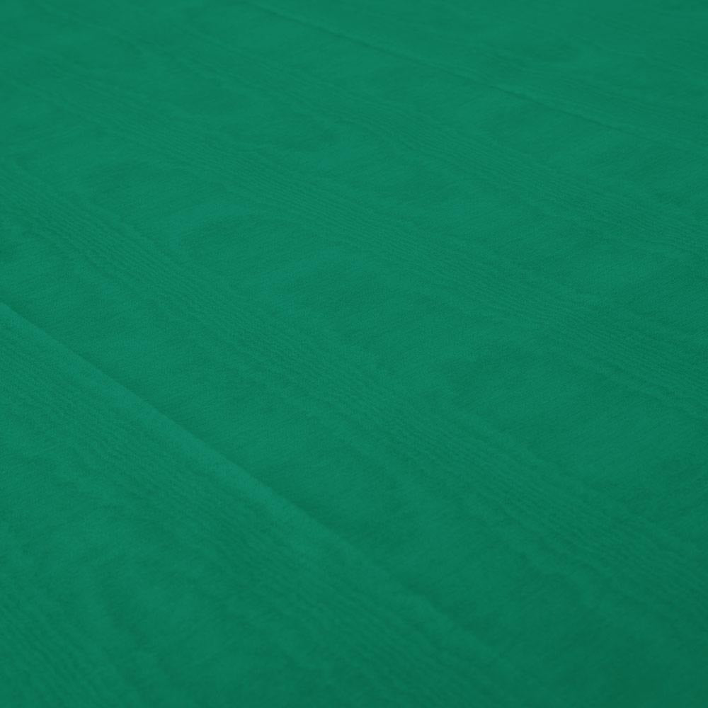 Green moire paper table cover with subtle textured pattern birthday from Parte Haus party supply store in Bethesda MD