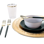Gold and black dinnerware set with clear gold rim cup elegant tableware for celebrations from Parte Haus party supply store in Bethesda MD.