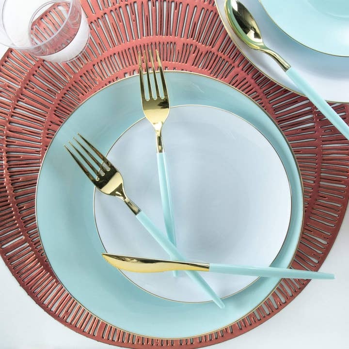 Blue and gold cutlery and plates table setting for birthday from Parte Haus party supply store in Bethesda MD