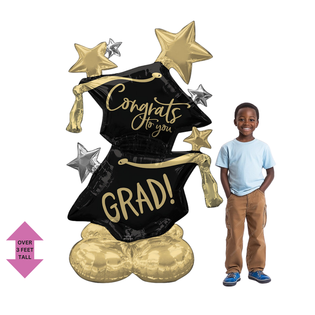 Gold and black graduation balloon bouquet with star accents for graduation from Parte Haus party supply store in Bethesda MD