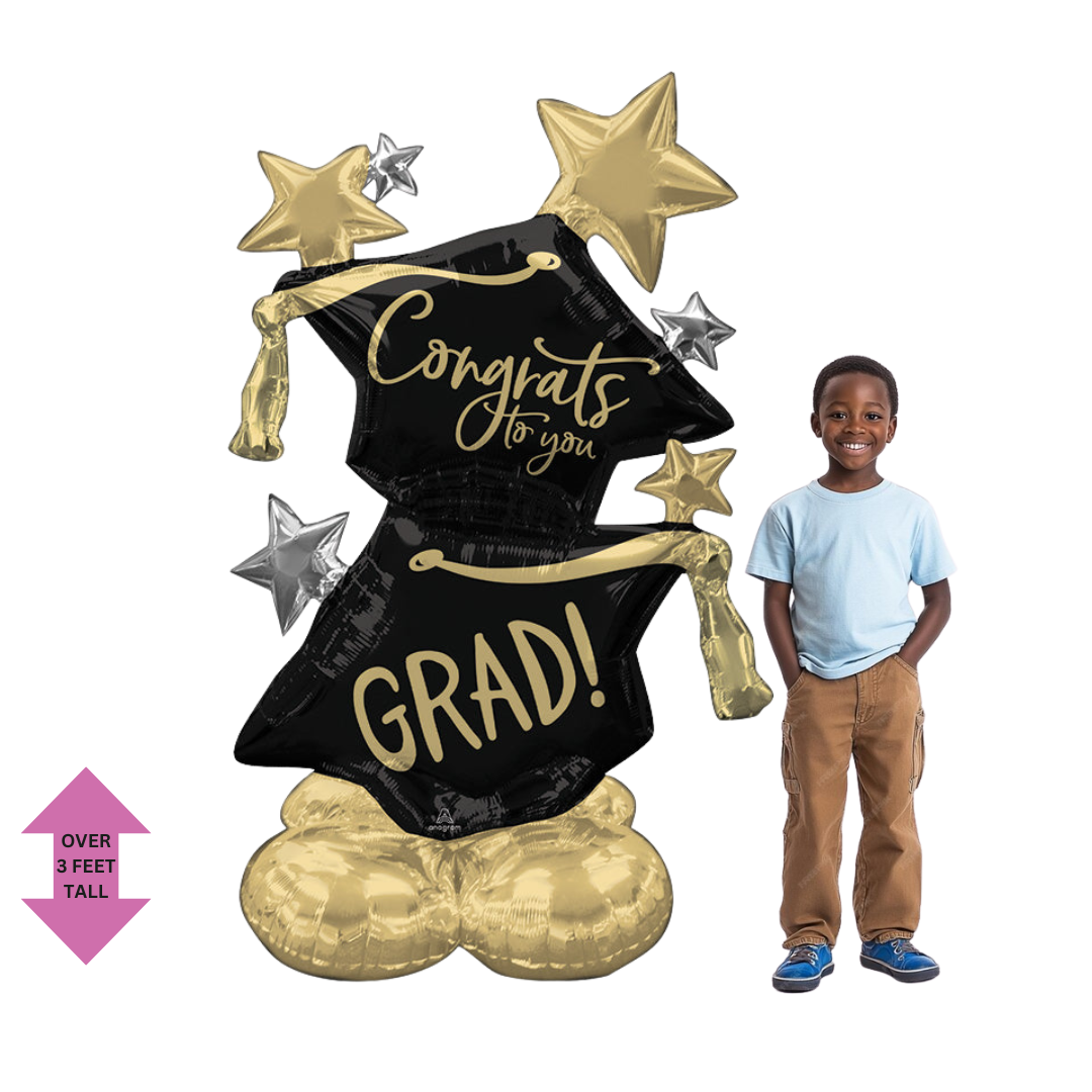 Gold and black graduation balloon bouquet with star accents for graduation from Parte Haus party supply store in Bethesda MD