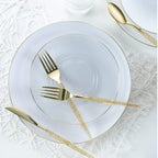 Gold and white plastic dinnerware set with glitter utensils for elegant event from Parte Haus party supply store in Bethesda MD
