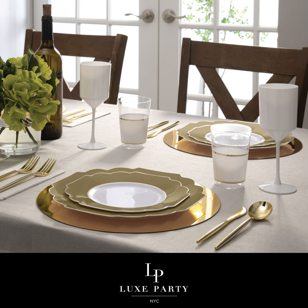 Gold and white plate set with gold cutlery table setting for elegant dinner party from Parte Haus party supply store in Bethesda Maryland