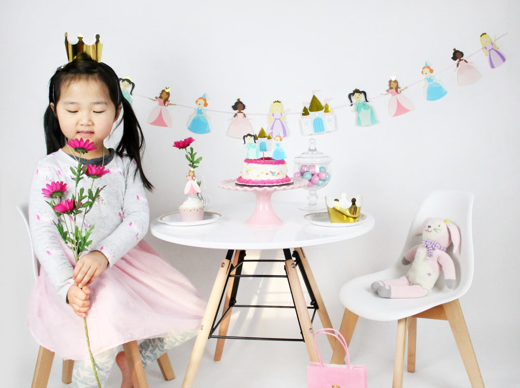 Pink princess birthday decorations with crown cake and girl theme from Parte Haus party supply store in Bethesda Maryland