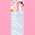 Light blue bride to be sash with white script for bachelorette from Parte Haus party supply store in Bethesda MD