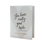 White anniversary card with gold heart design and handwritten style text romantic theme from Parte Haus party supply store in Bethesda Maryland