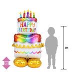 Rainbow birthday cake foil balloon with candles for birthday celebration from Parte Haus party supply store in Bethesda MD