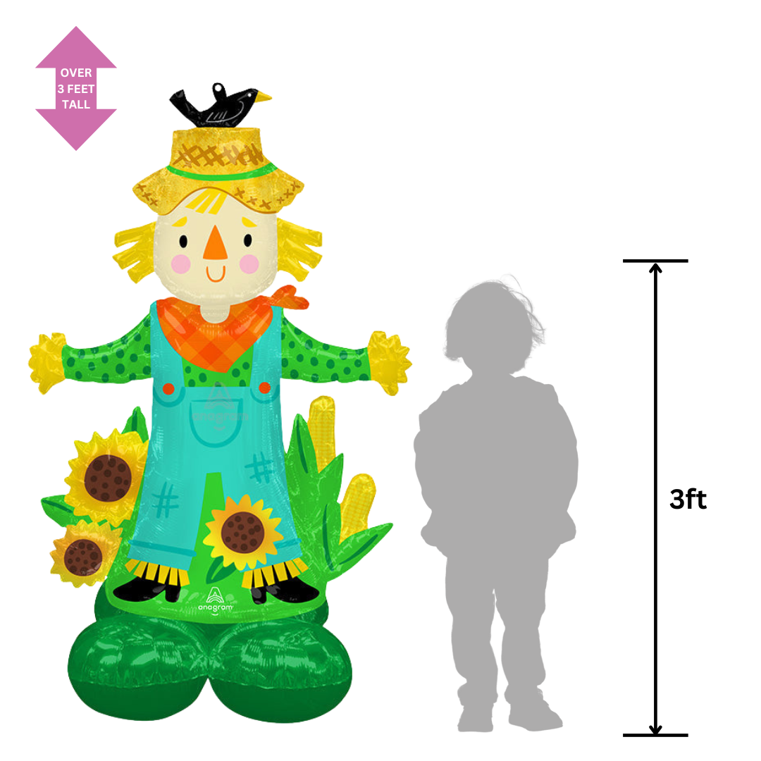 Colorful scarecrow inflatable balloon with sunflowers for fall harvest from Parte Haus party supply store in Bethesda Maryland