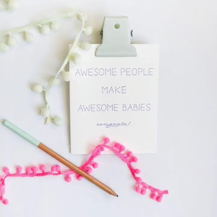 white letterpress new baby congrats card with pastel pencil and pom garland baby shower from Parte Haus party supply store in Bethesda Maryland