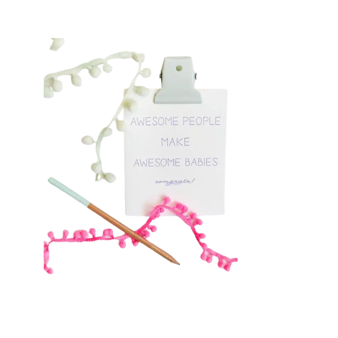 White letterpress new baby parents congrats card with pen and decorations baby shower theme from Parte Haus party supply store in Bethesda Maryland