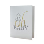 White oh baby card with gold and grey pacifier for baby shower from Parte Haus party supply store in Bethesda Maryland