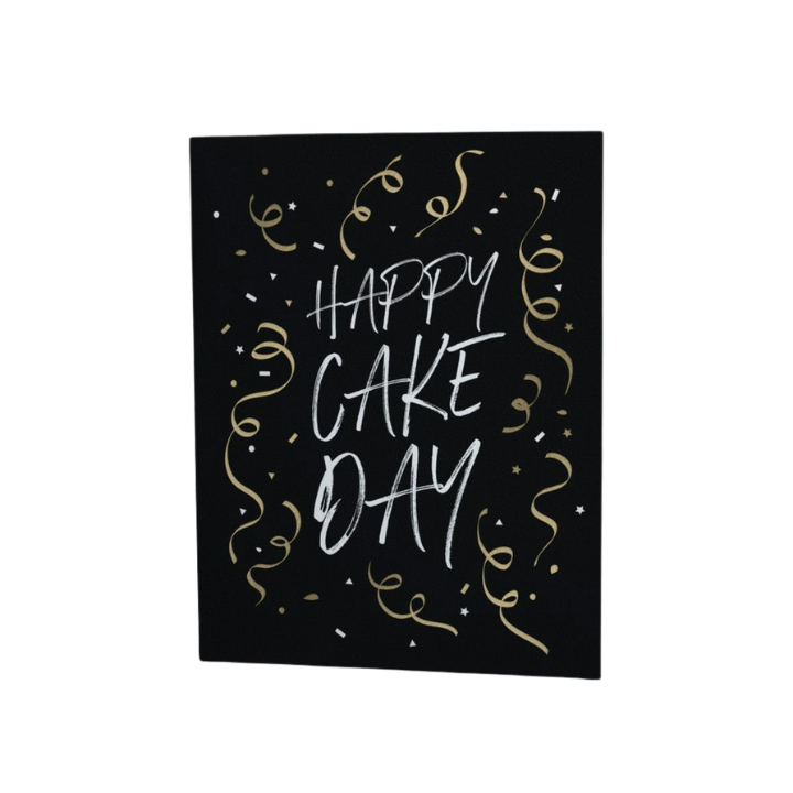 Black and gold happy cake day greeting card with confetti for birthday from Parte Haus party supply store in Bethesda MD