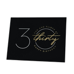 Black and gold 30th birthday napkin with fun flirty script from Parte Haus party supply store in Bethesda MD