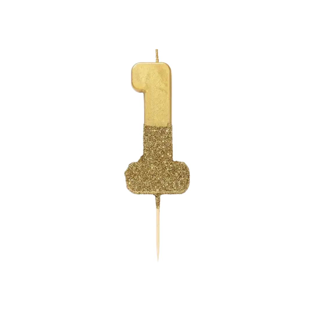Gold number one birthday candle with glitter for first birthday from Parte Haus party supply store in Bethesda MD.