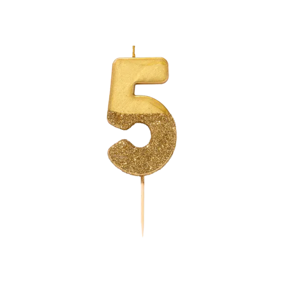 Gold number 5 glitter birthday candle for cake celebrations from Parte Haus party supply store in Bethesda MD.