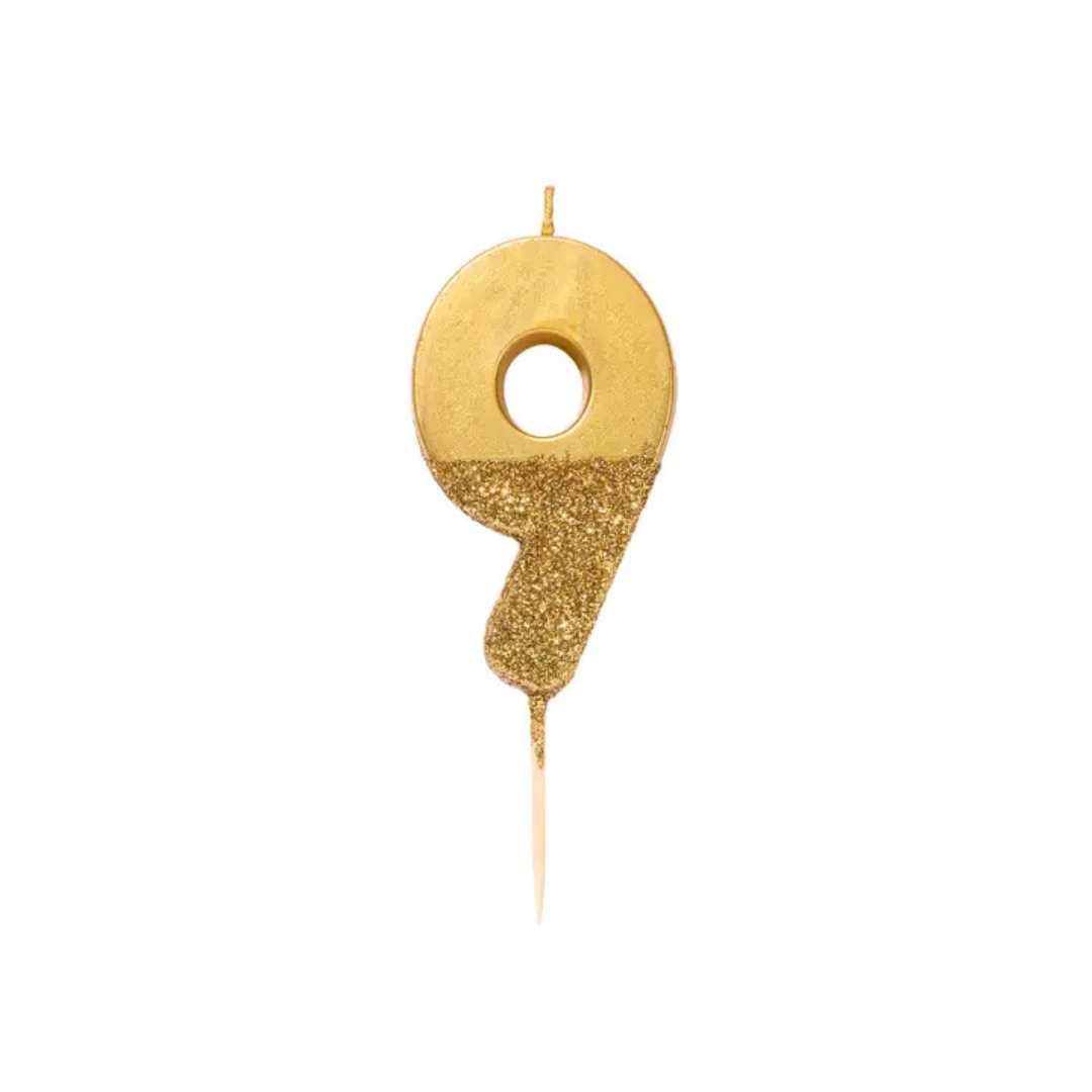 Gold number nine glitter birthday candle from Parte Haus party supply store in Bethesda Maryland