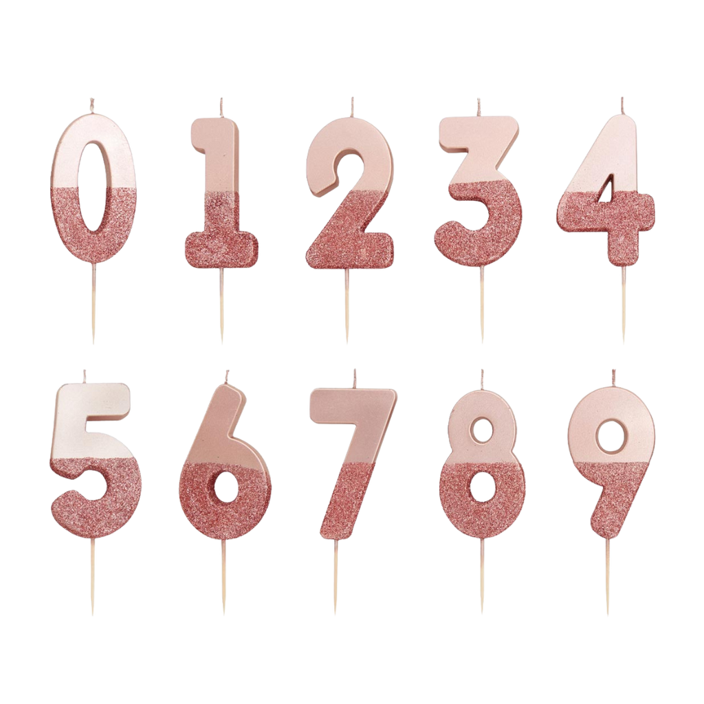 Rose gold number candles with glitter for birthdays from Parte Haus party supply store in Bethesda Maryland