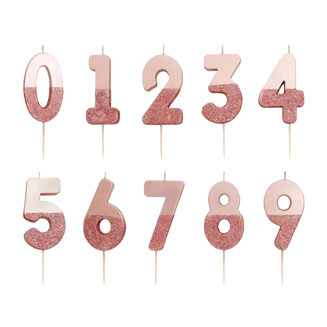 Rose gold number candles with glitter for birthdays from Parte Haus party supply store in Bethesda Maryland