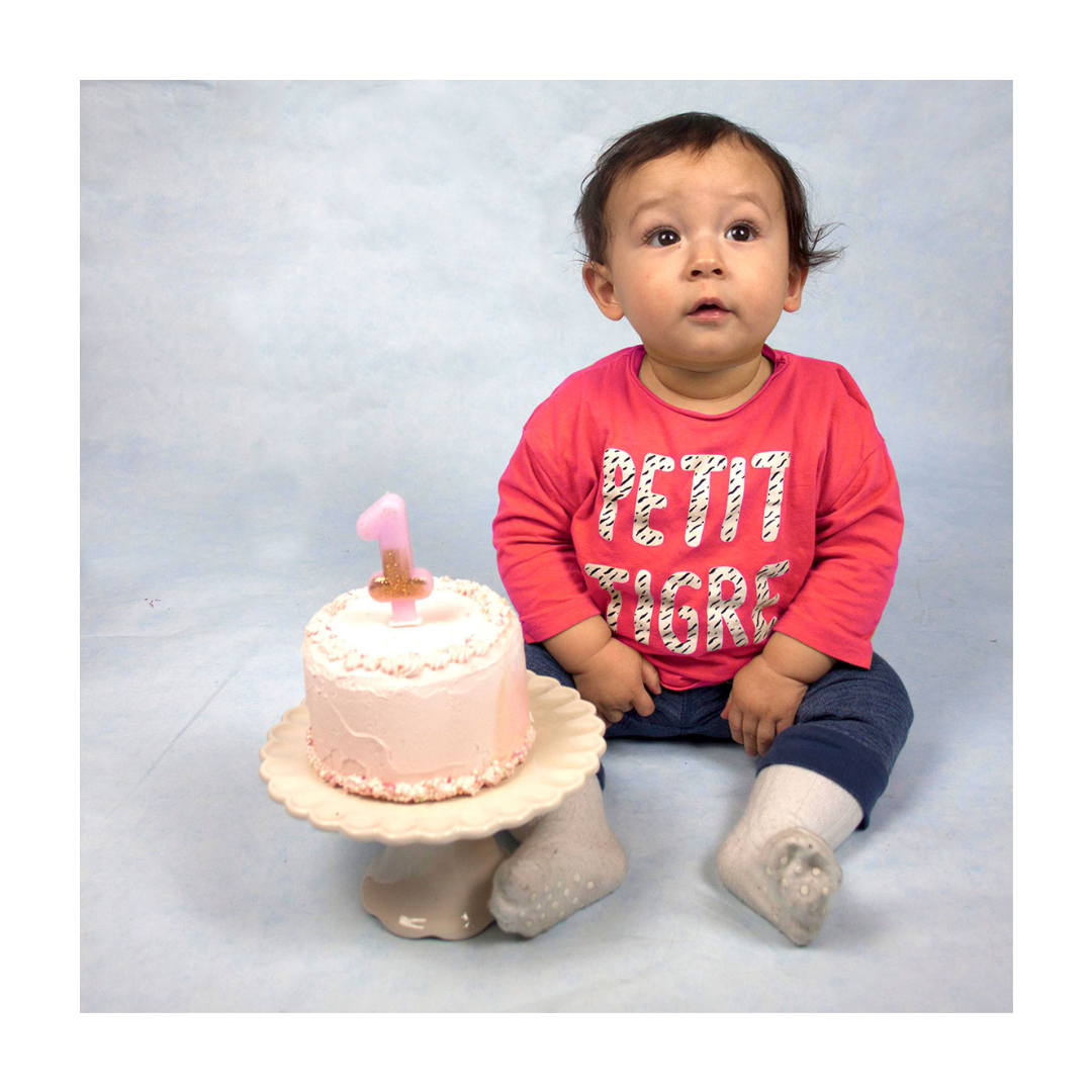 Pink birthday candle starter kit with number one candle and cake for first birthday from Parte Haus party supply store in Bethesda Maryland