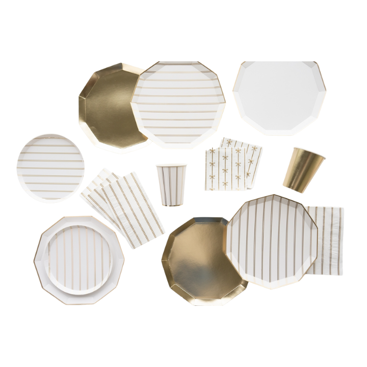 Gold and white disposable tableware set with stripes for celebration from Parte Haus party supply store in Bethesda, Maryland