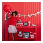 Red and white kids party setup with bows theme birthday decor from Parte Haus party supply store in Bethesda MD