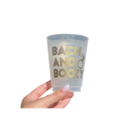 Gold frosted plastic cup with Bach and Boozy text and ring graphic for bachelorette from Parte Haus party supply store in Bethesda MD