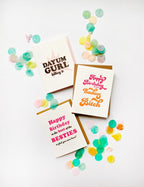 Colorful birthday letterpress greeting cards with bold text and pastel confetti for birthday from Parte Haus party supply store in Bethesda Maryland