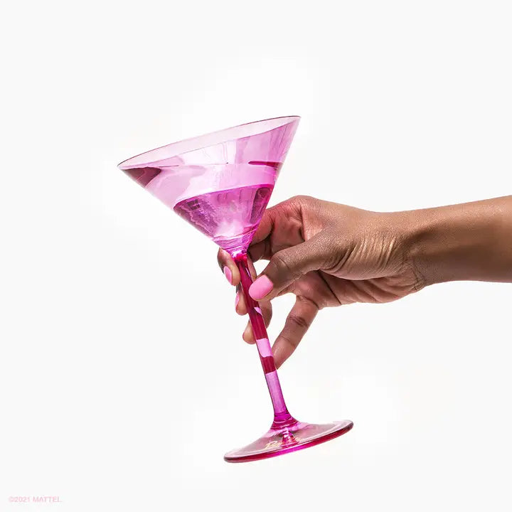 Pink martini glass held in hand Barbie theme from Parte Haus party supply store in Bethesda MD