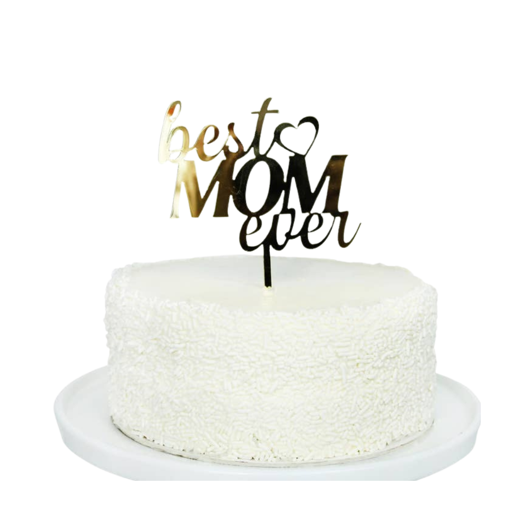 Gold acrylic Best Mom Ever cake topper on white cake Mother’s Day from Parte Haus party supply store in Bethesda MD.