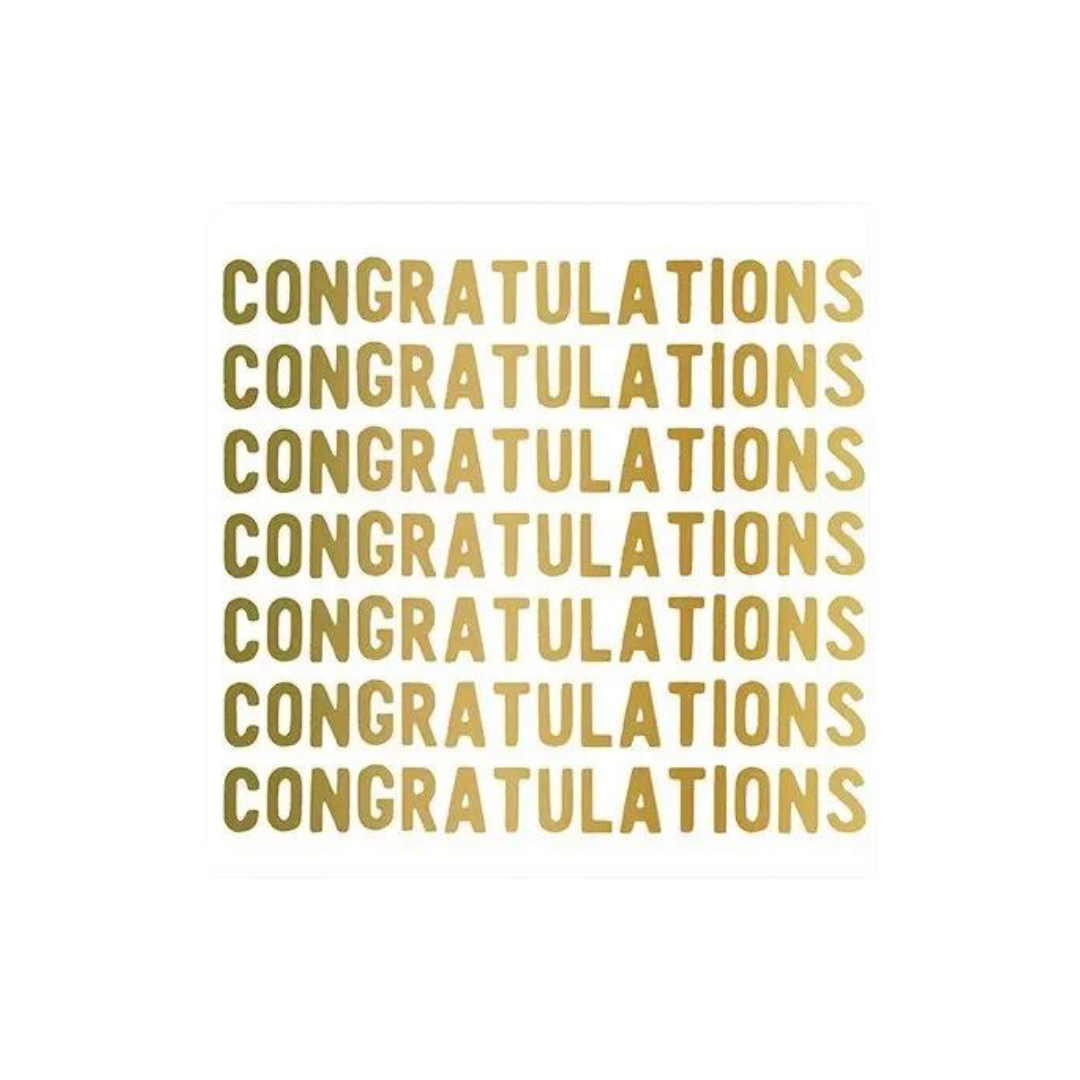 Gold and white beverage napkin with repeated congratulations text graduation theme from Parte Haus party supply store in Bethesda Maryland