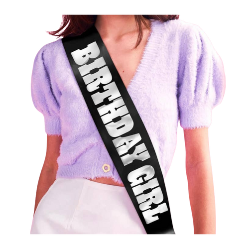 Black iridescent birthday girl sash with bold white letters birthday theme from Parte Haus party supply store in Bethesda MD