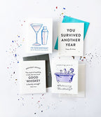 White and purple birthday greeting cards with fun designs birthday theme from Parte Haus party supply store in Bethesda MD