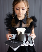 Black and white striped square dinner plate Halloween theme from Parte Haus party supply store in Bethesda Maryland