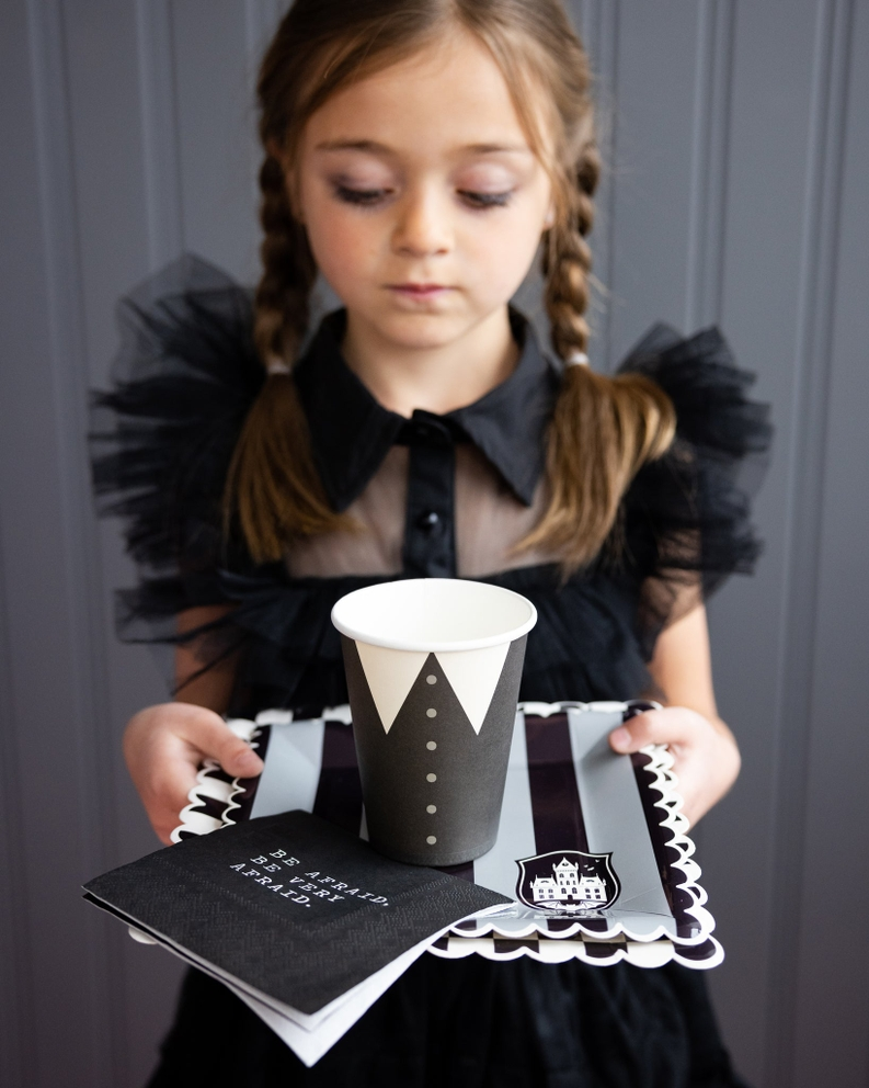 Black and white striped square dinner plate Halloween theme from Parte Haus party supply store in Bethesda Maryland