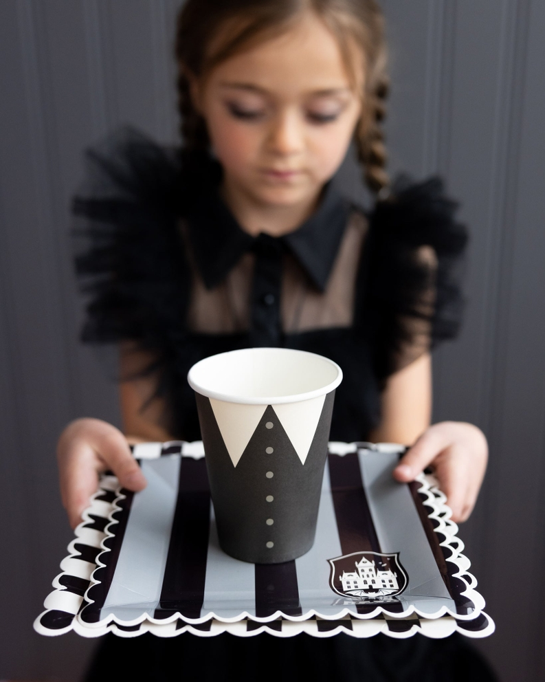 Black and white striped square large dinner plate with scalloped edge Halloween theme from Parte Haus party supply store in Bethesda MD