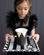 Black and white striped square large dinner plate with scalloped edge Halloween theme from Parte Haus party supply store in Bethesda MD