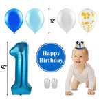 Blue first birthday decoration kit with balloons crown and crawling baby from Parte Haus party supply store in Bethesda MD