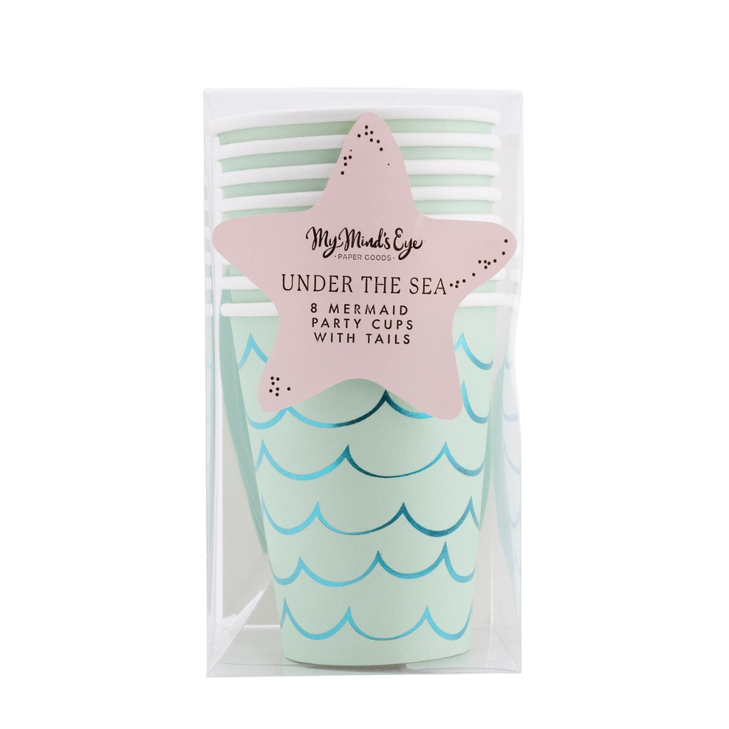 Blue green mermaid tail cups with wave patterns under the sea theme from Parte Haus party supply store in Bethesda MD