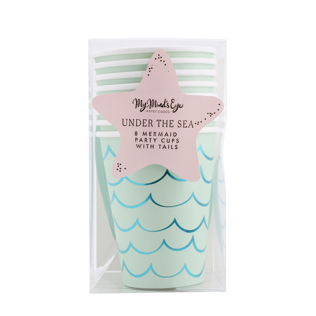 Blue green mermaid tail cups with wave patterns under the sea theme from Parte Haus party supply store in Bethesda MD