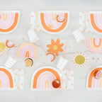 Peach and pink rainbow plates with napkins and cups boho birthday from Parte Haus party supply store in Bethesda MD