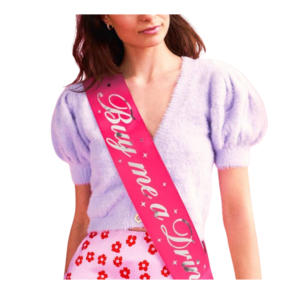 Pink Buy Me a Drink sash with silver stars for bachelorette from Parte Haus party supply store in Bethesda Maryland