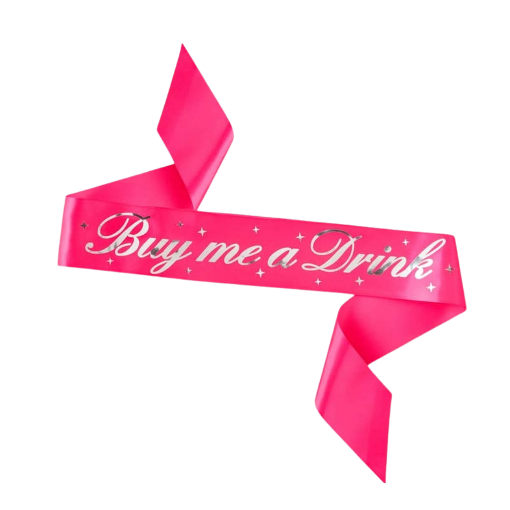 Pink Buy Me A Drink sash with silver stars bachelorette theme from Parte Haus party supply store in Bethesda Maryland