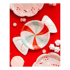Red and pastel swirl candy-shaped plate Christmas paper plate with festive candy patterns from Parte Haus party supply store in Bethesda MD