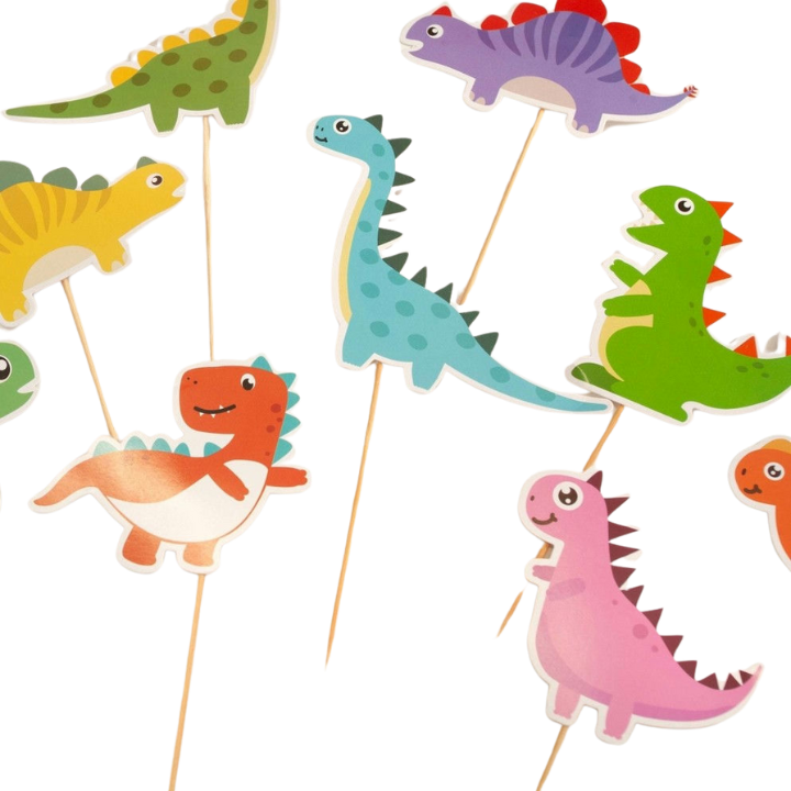 Colorful dinosaur cupcake toppers with smiling faces dinosaur theme from Parte Haus party supply store in Bethesda MD.
