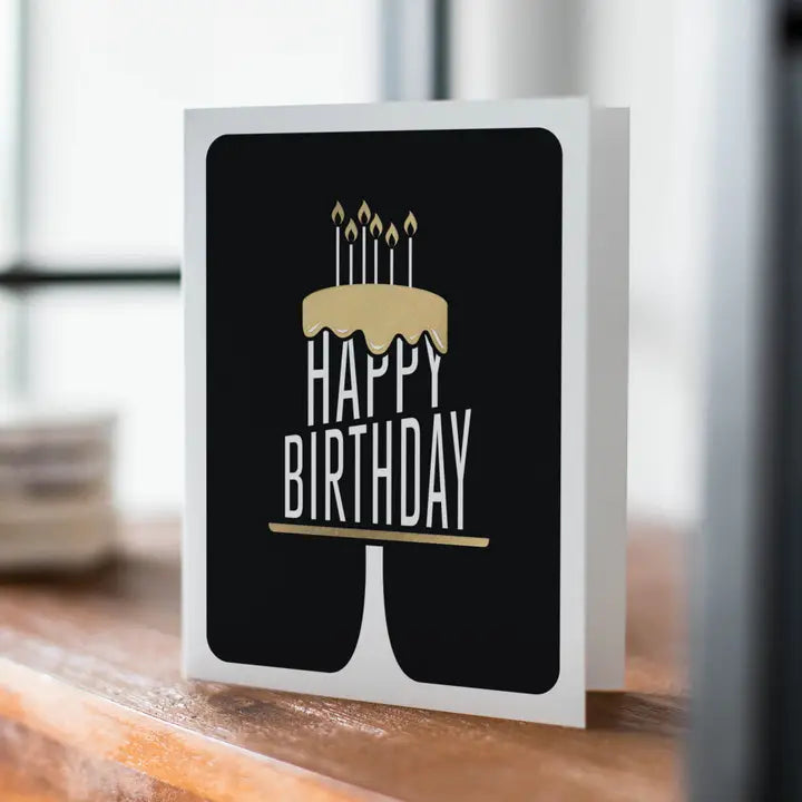 black and gold birthday card with cake and candles for birthday from Parte Haus party supply store in Bethesda Maryland