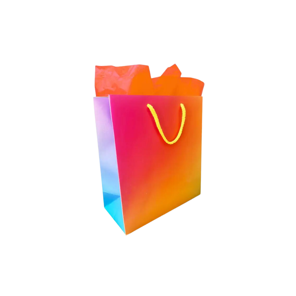 Colorful gradient gift bag with yellow handles for birthdays from Parte Haus party supply store in Bethesda Maryland