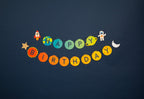 Colorful space theme birthday banner with planets rocket and astronaut from Parte Haus party supply store in Bethesda MD