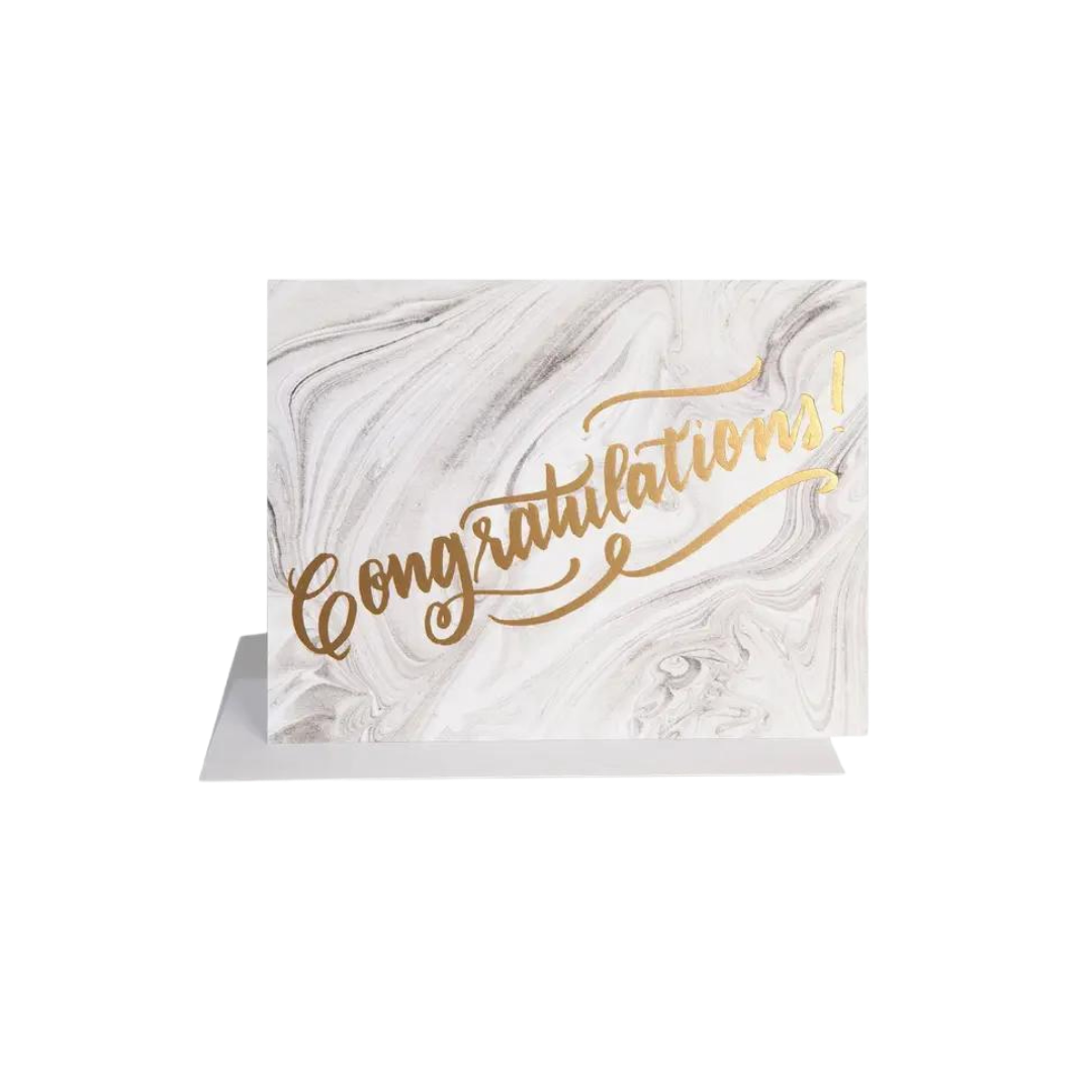 white marble congratulations card with gold lettering for celebration from Parte Haus party supply store in Bethesda Maryland